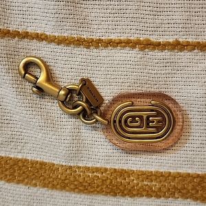 Spinning Coach Retro Graphic Bag Charm in pink